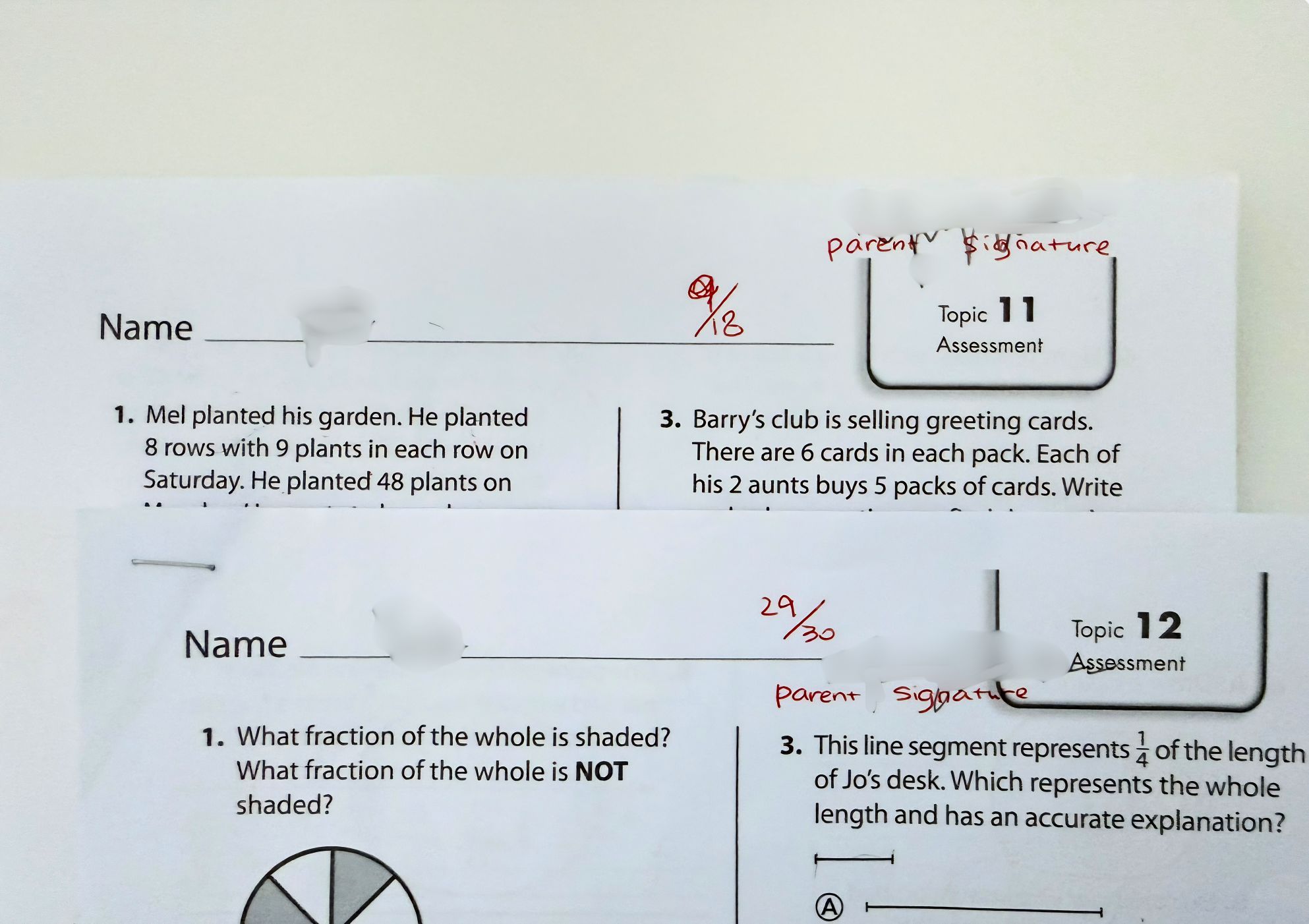 Exam papers showing grade improvement